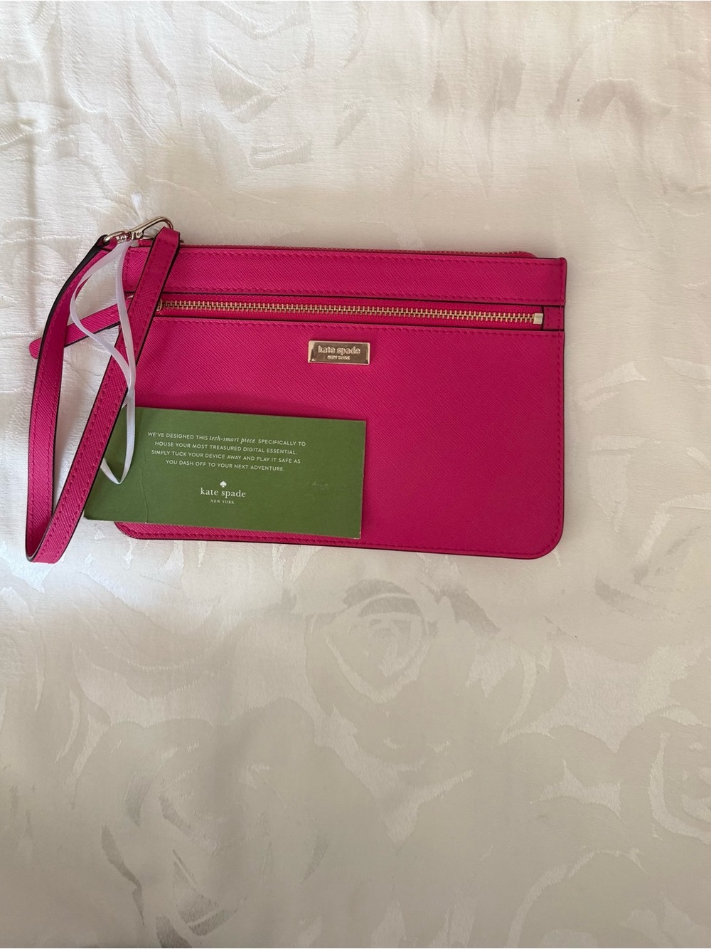 NWT Kate Spade Laurel Way Tinie Wristlet Saffiano Leather Radish Pink WLRU2677
